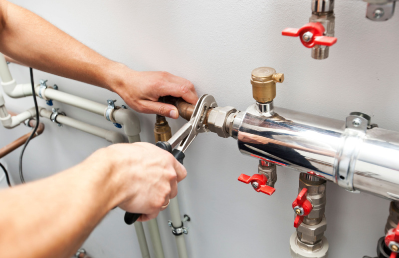 Who is responsible for an ejector pump in a condo unit?