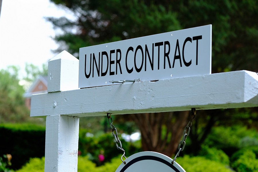 Can a condo board require a copy of a sale contract?